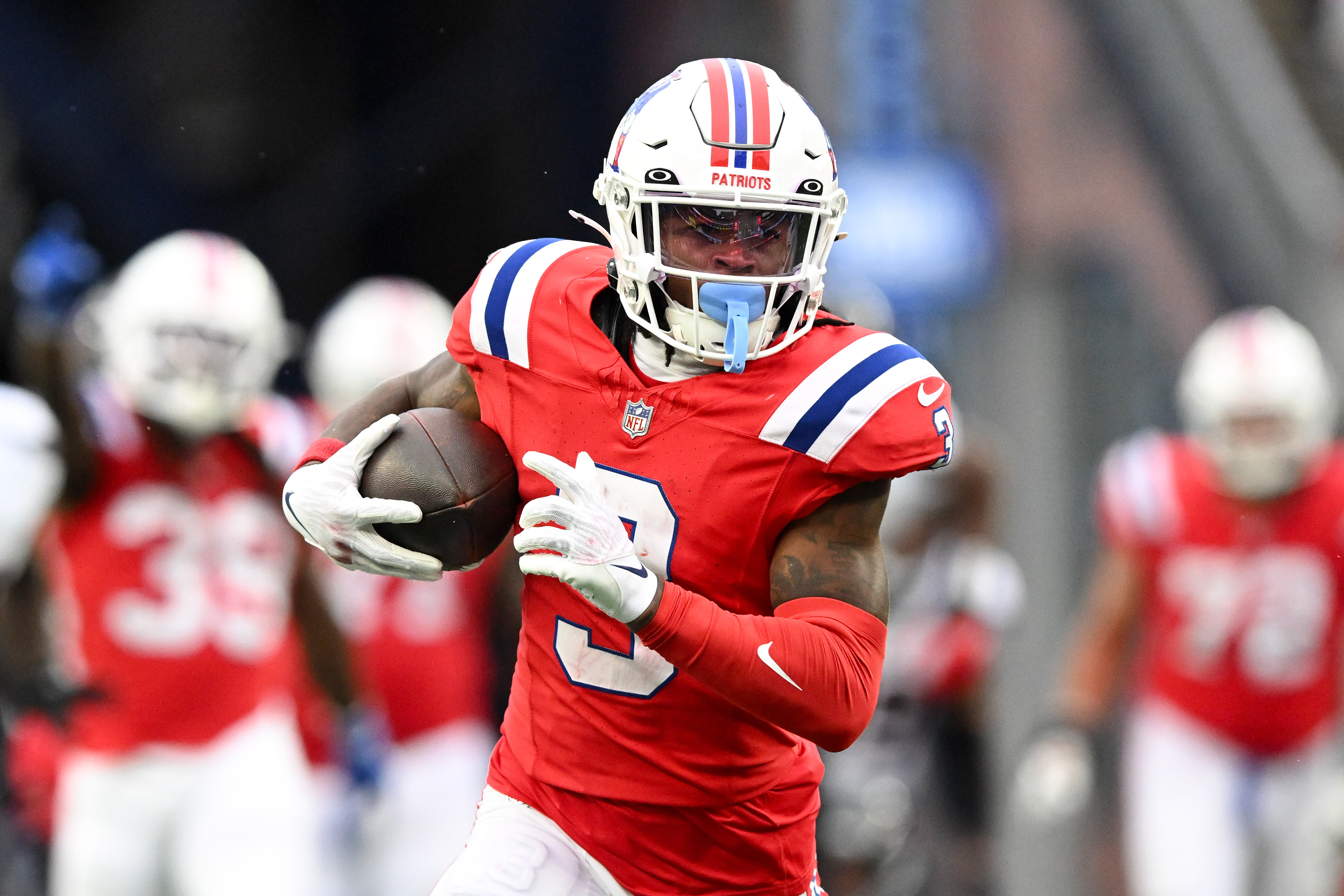 New England Patriots wide receiver DeMario Douglas (3) runs for a touchdown against the Houston Texans during the first half at Gillette Stadium. Mandatory Credit: Brian Fluharty-Imagn Images